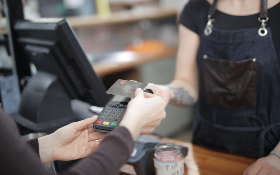 Dojo card reader being used in a busy restaurant