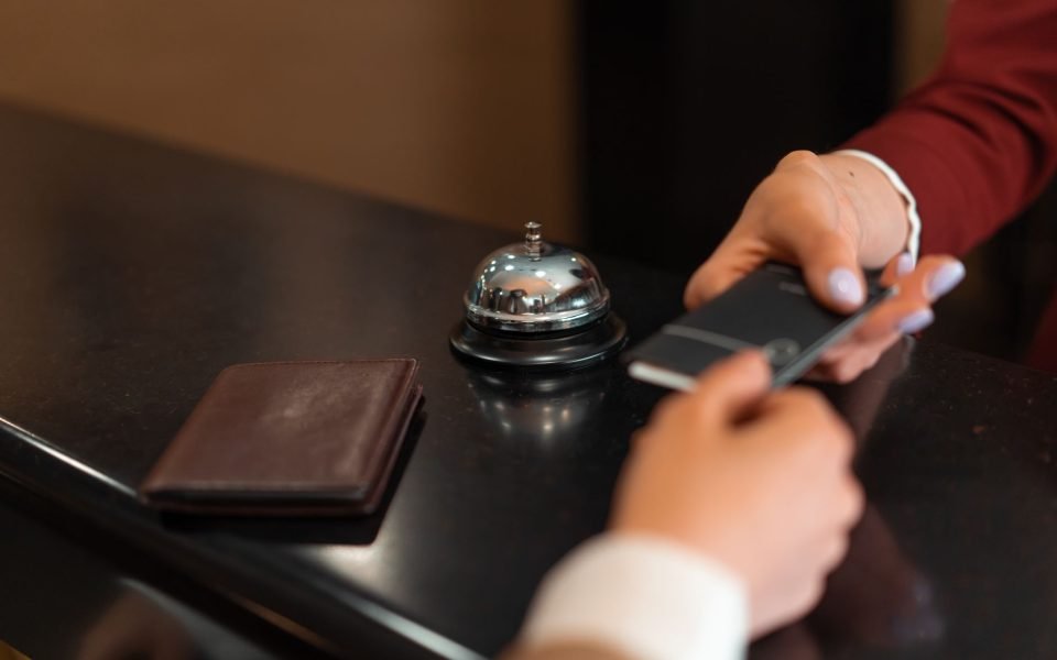 Elavon payment terminal at a hotel reception desk
