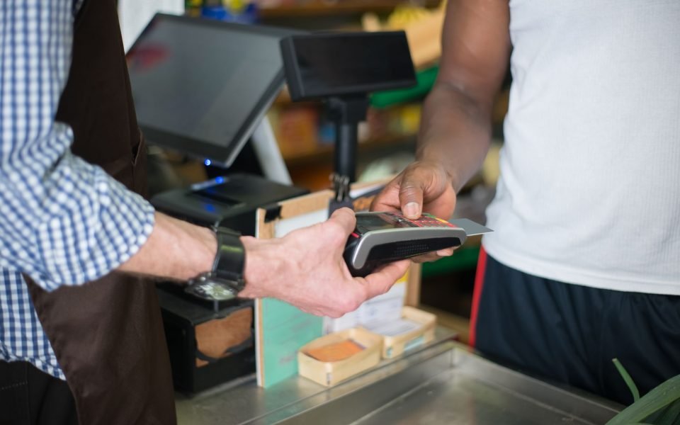 Worldpay card machine on a shop counter