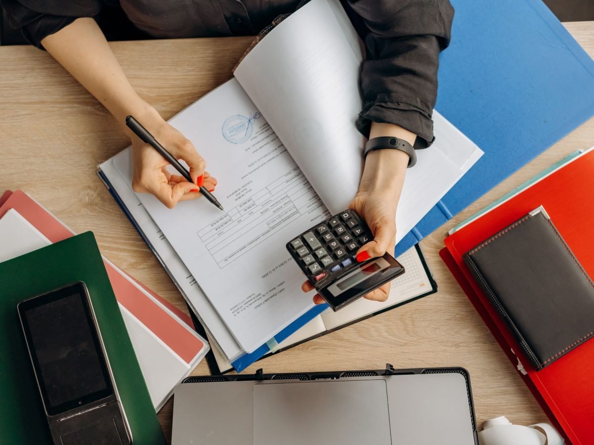 Small business owner reviewing finance options on a laptop